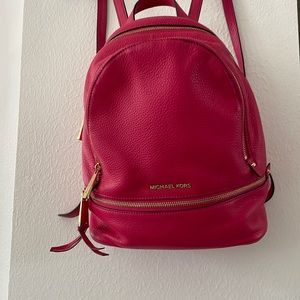 Michael Kors fuschia backpack